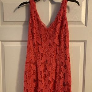 More pink or coral.  Very pretty comes above knee. Worn to a wedding